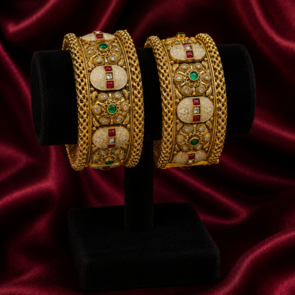 Elegant Pair Of Antique Gold-Toned Bangles